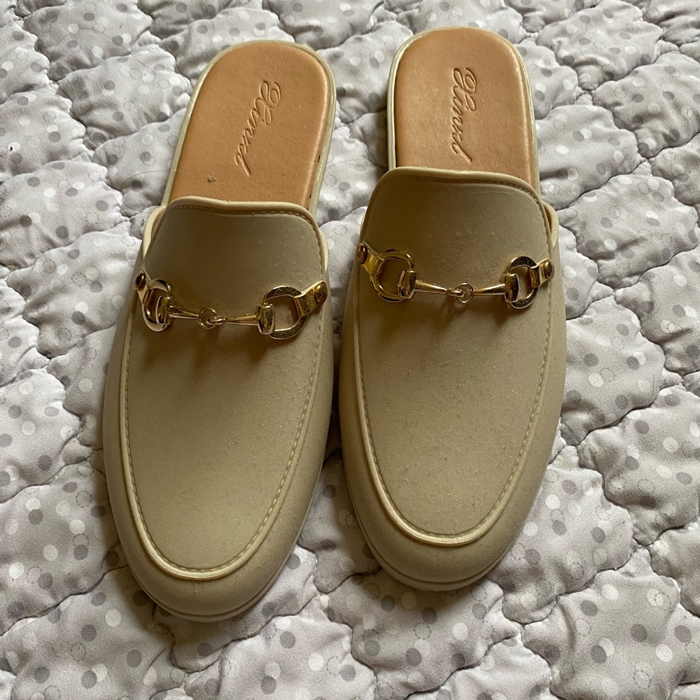 Beige rubber slides